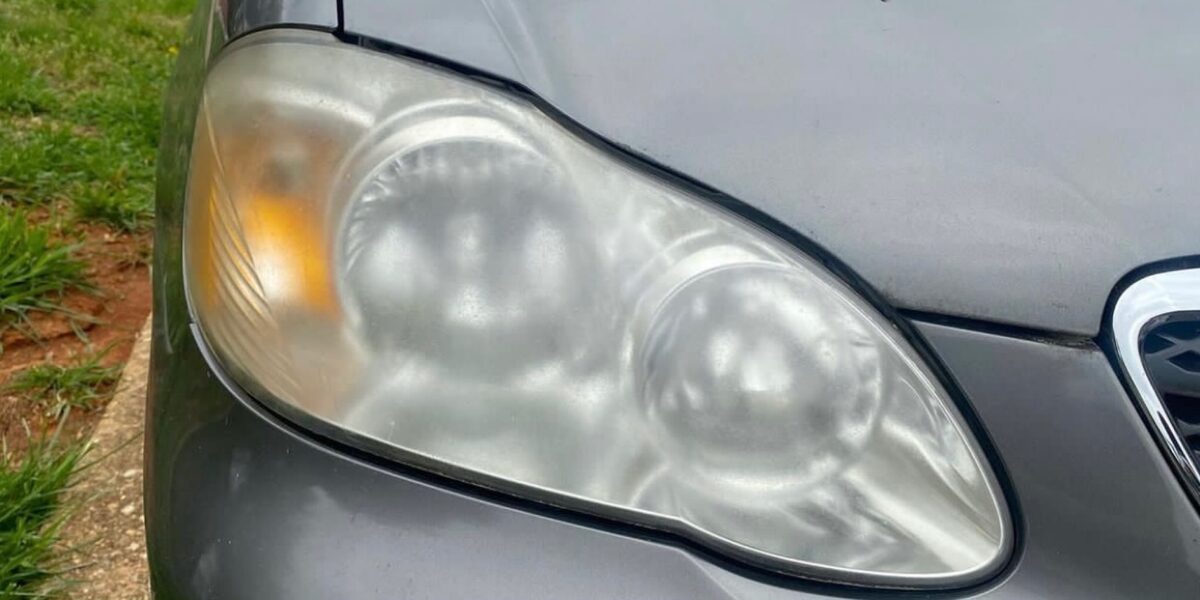Foggy, yellowed headlight before restoration