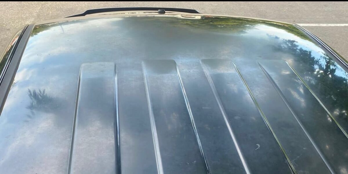 Oxidized, faded hood before polishing