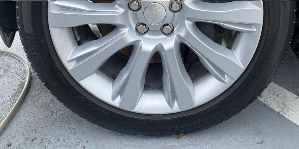 Spotless wheel and dressed tire after detailing