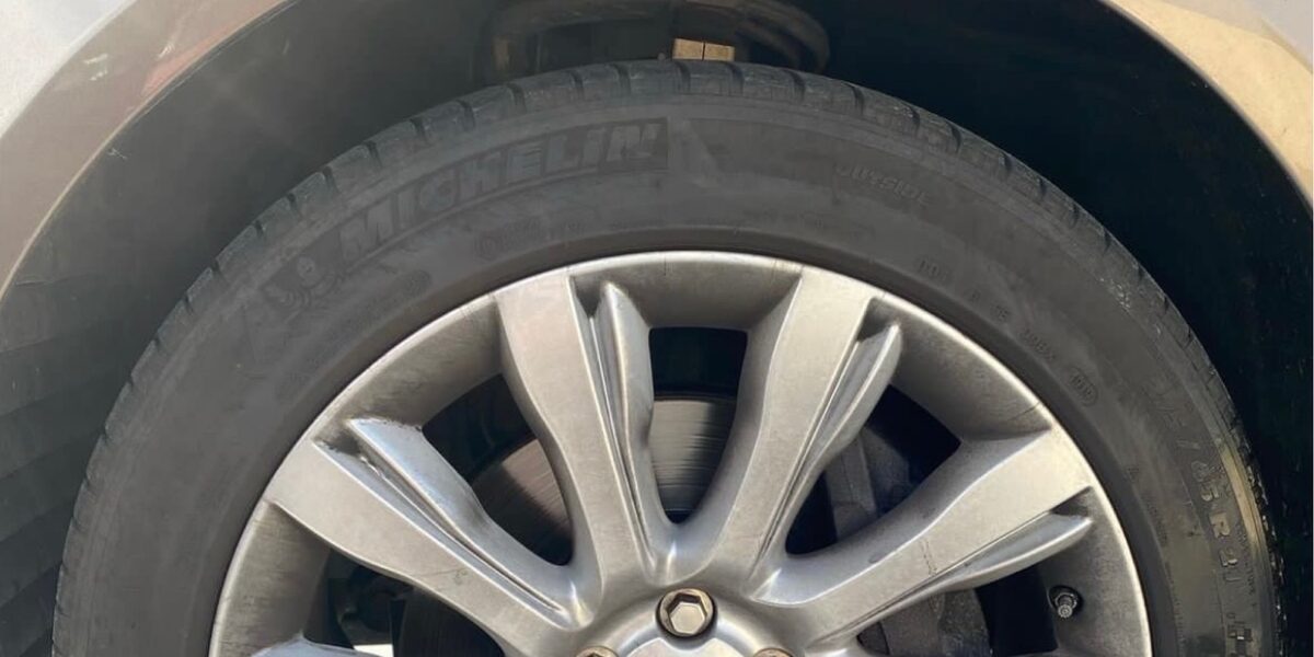 Brake-dust covered wheel before detailing