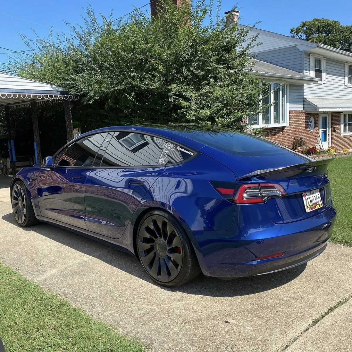 Blue Tesla Model 3 rear after ceramic coating