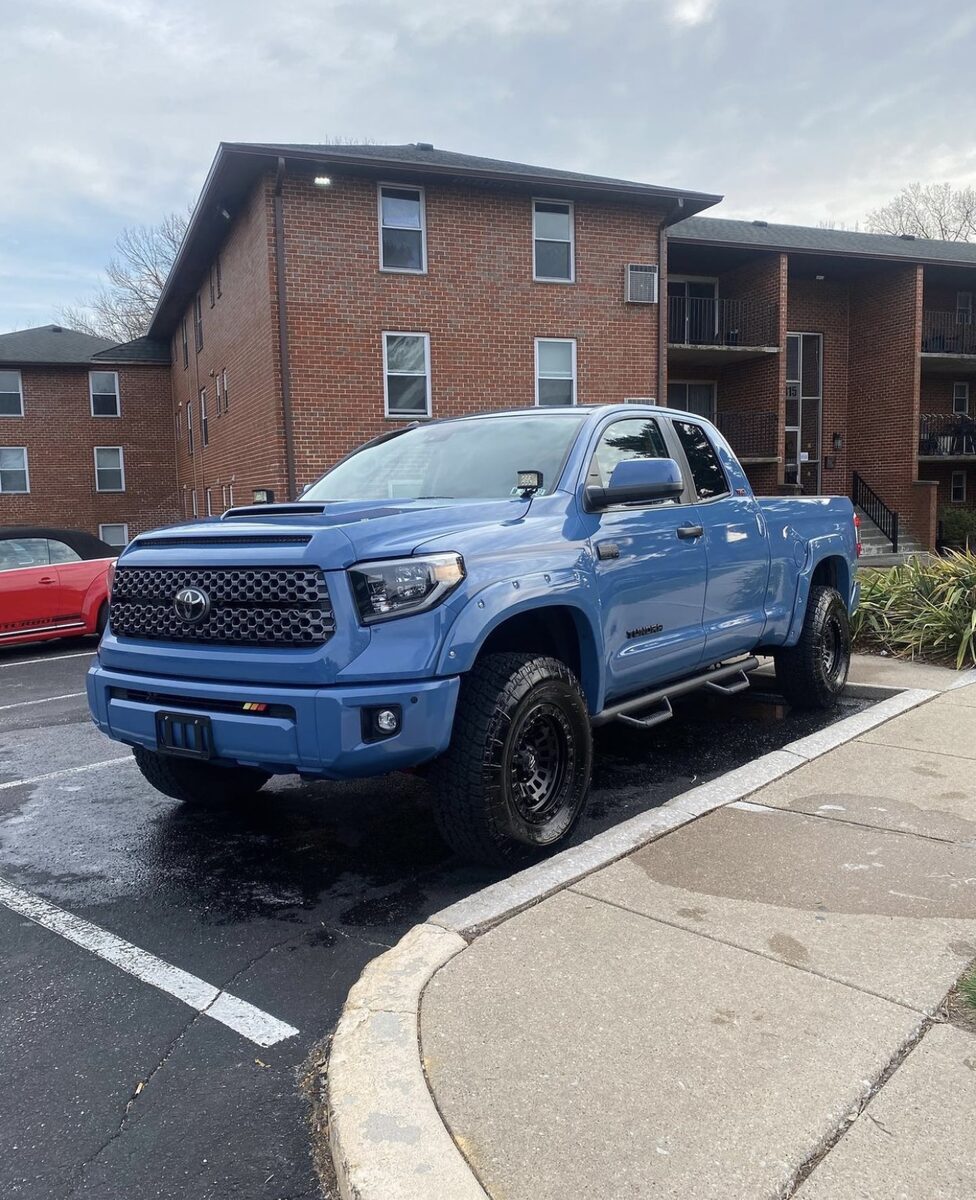Blue pickup truck after wash and wax