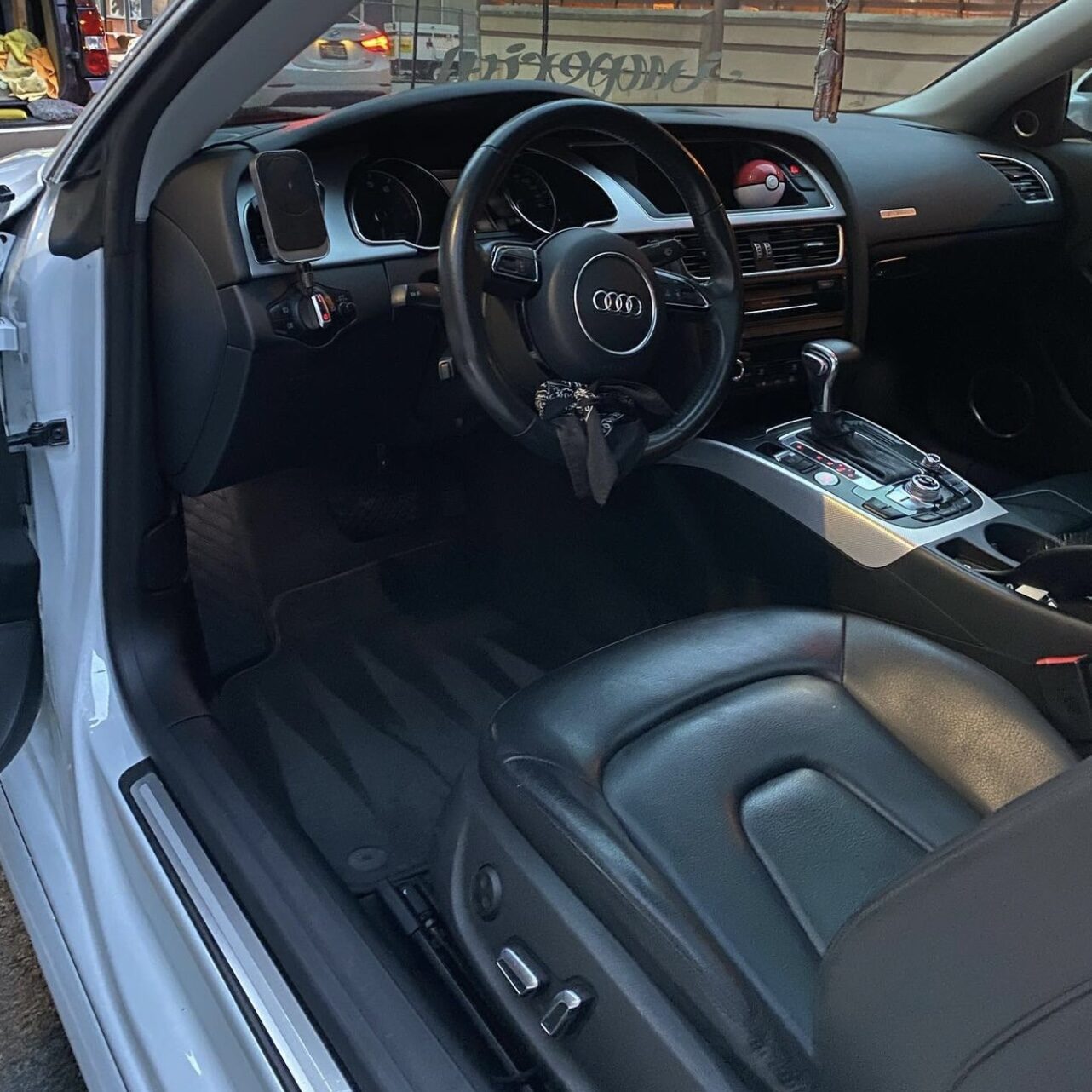 Audi interior with black leather after detailing